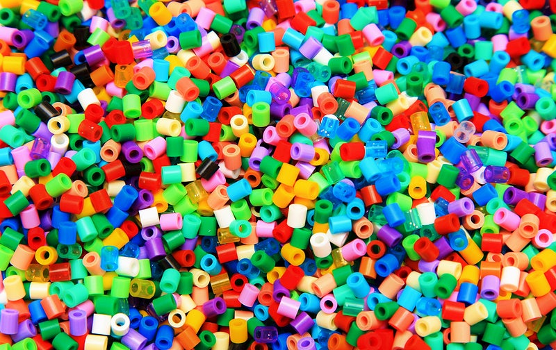 a pile of rainbow-colored plastic beads