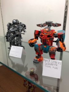 Display of the following LEGO sets: Iron Monger Mayhem and Tony Stark's Sakaarian Iron Man