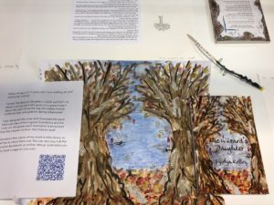 Original collage of trees made with paint and paper, alongside the book cover which features a scaled-down version of the tree art