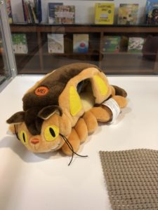 A plush toy of Catbus from the movie "Totoro"