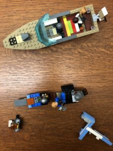 Aerial-view of LEGO speedboat and small creations