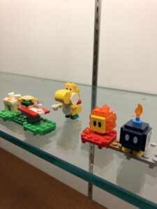 Display case with Mario characters made of LEGOs