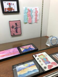 Collection of small works of art on display