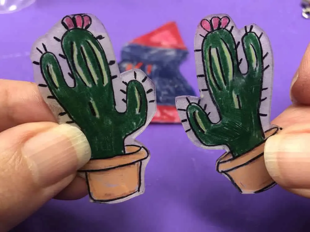 two cactus shrinky dinks