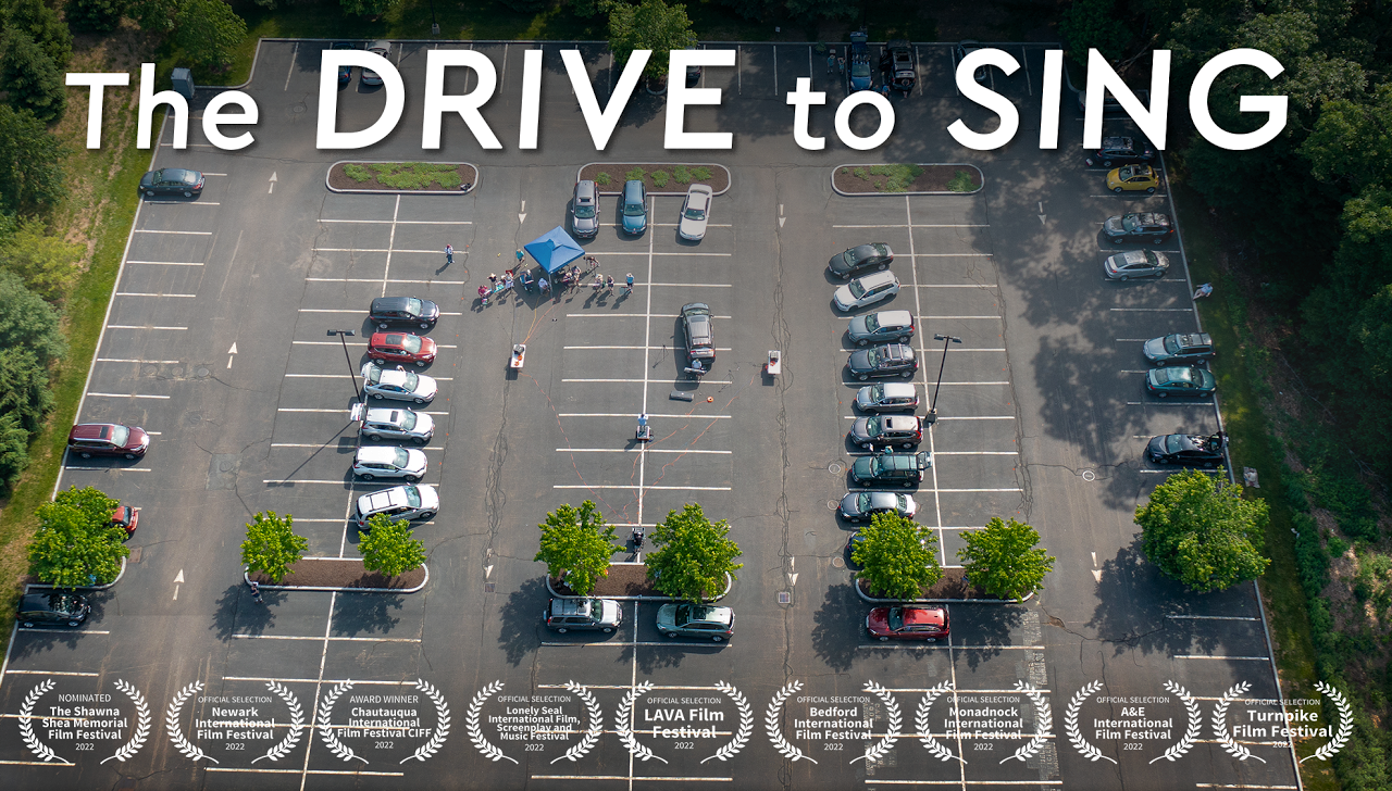 movie still of cars in parking lot