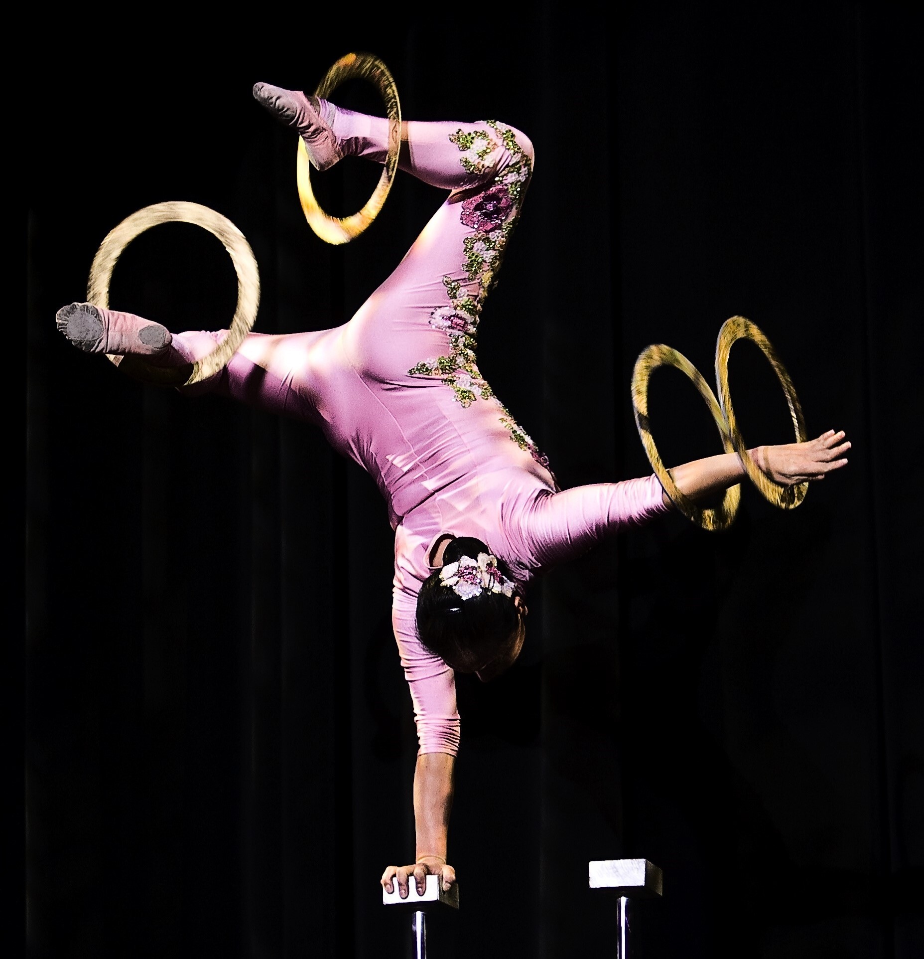 A Chinese acrobat performs hand balancing.
