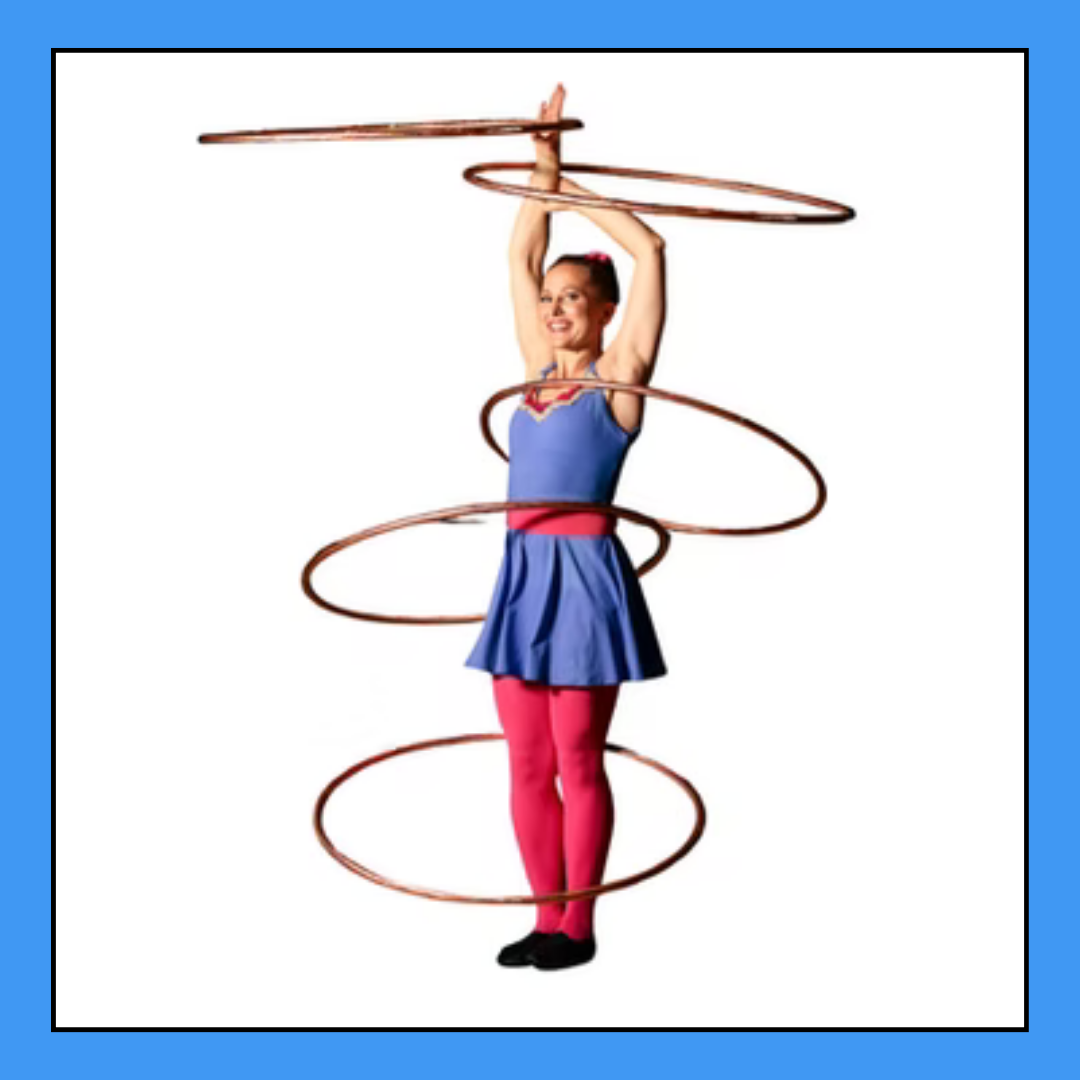A circus performer uses five hula hoops.